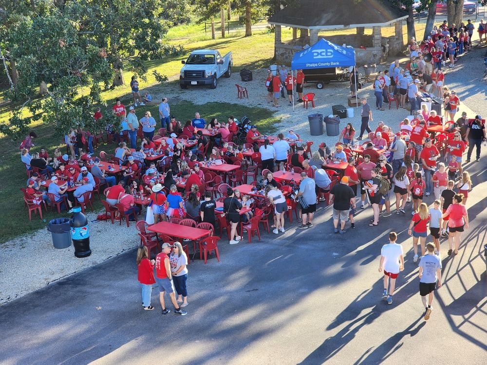 Tiger Community enjoys the tailgate party. 