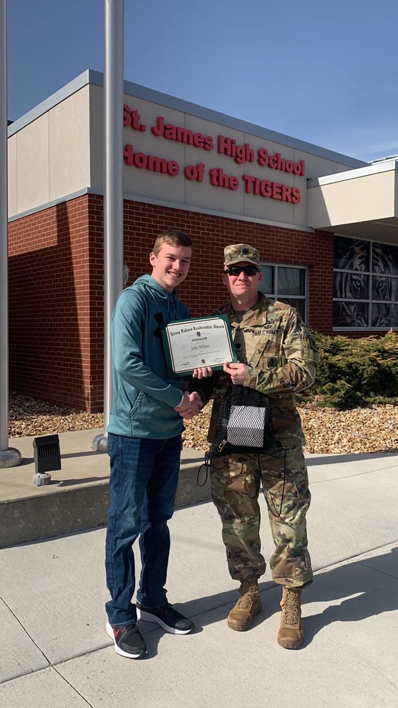 Student receives award from Fort Leonard Wood. 