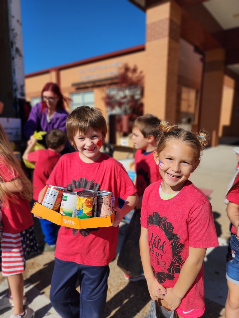 First Grade held a canned food drive for The Caring Center. 
