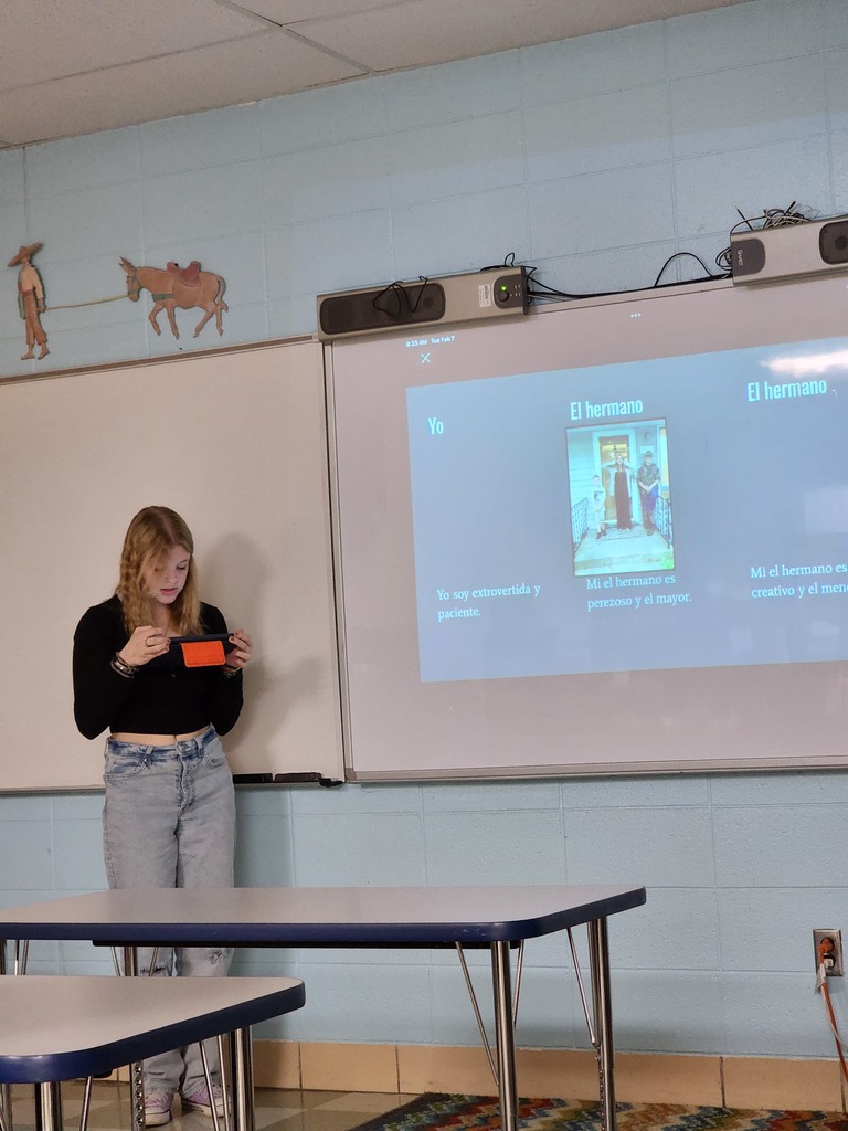 Spanish I students learn about families.