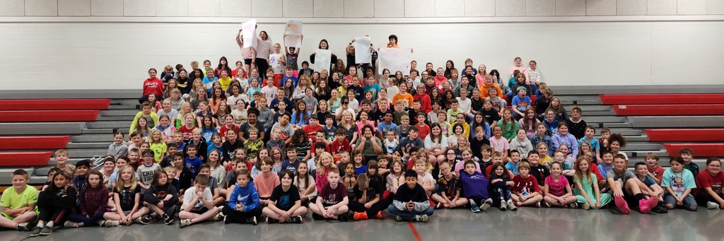 4th and 5th grade students pose for a photo to celebrate reading 3,300 books this school year!